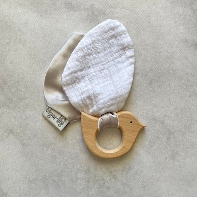 Hard wood teething ring and soft bird wings made from cotton muslin and satin.
