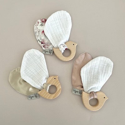 Hard wood teething ring and soft bird wings made from cotton muslin and satin.