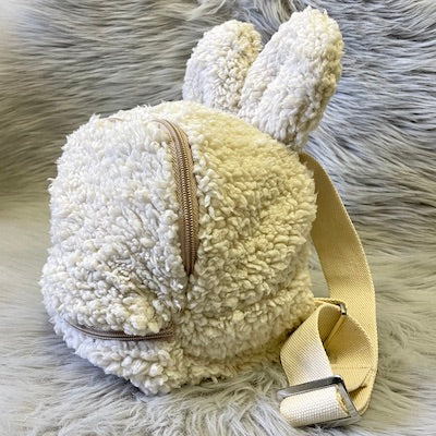 Baby backpacks with teddy ears (oat) made with fluffy teddy bear fabrics.