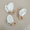 Hard wood teething ring and soft bird wings made from cotton muslin and satin.