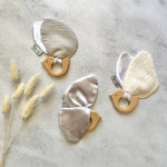 Hard wood teething ring and soft bird wings made from cotton muslin and satin.