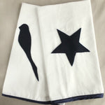 Blankie made from brushed cotton, trimmed with navy satin edging and embellished with a navy felt shape.