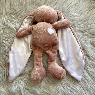 Pink cuddle bunny with white heart and silk ears